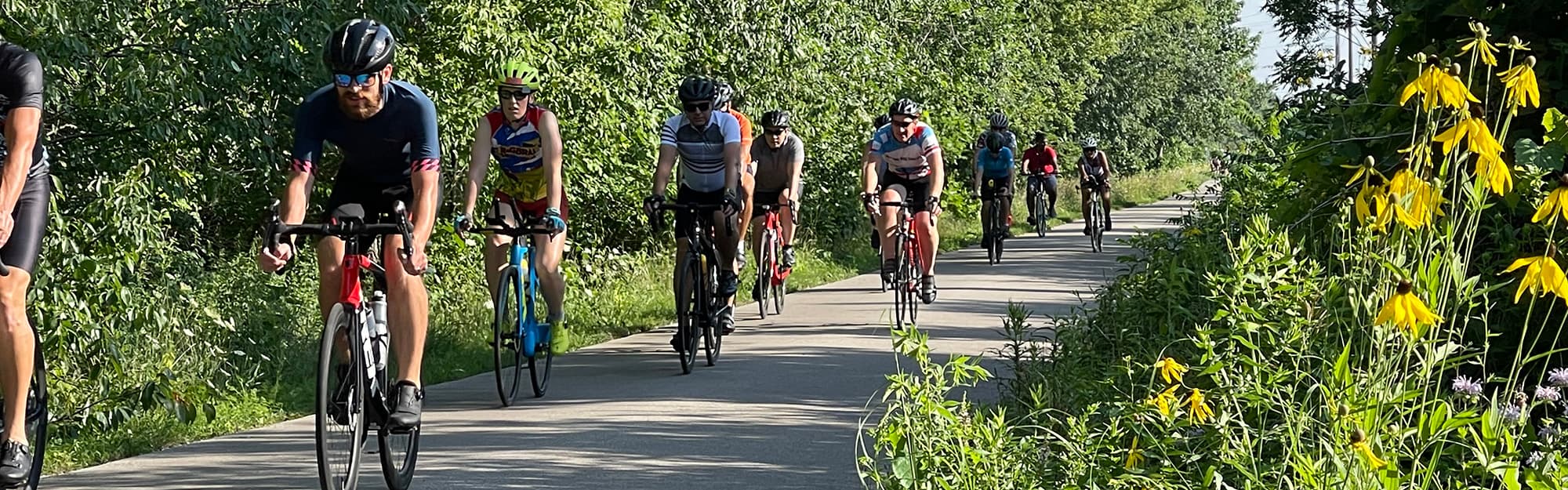 bike riders on a trail